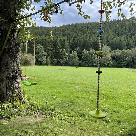 With Garden By The River And A View In Sankt Vith *